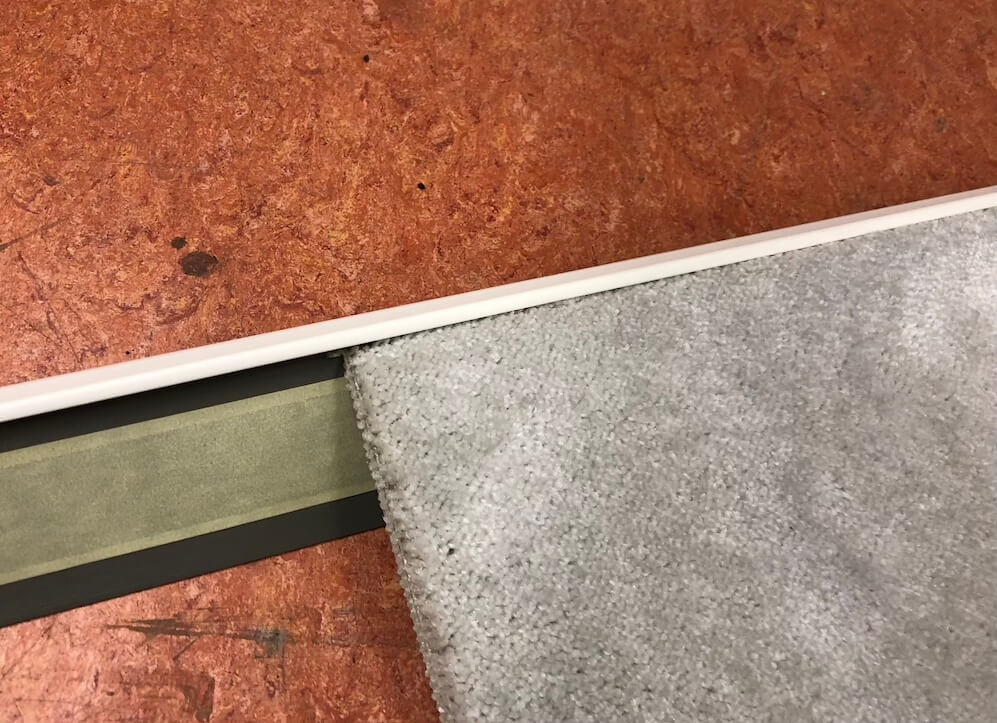 Teppich in PVC Leiste